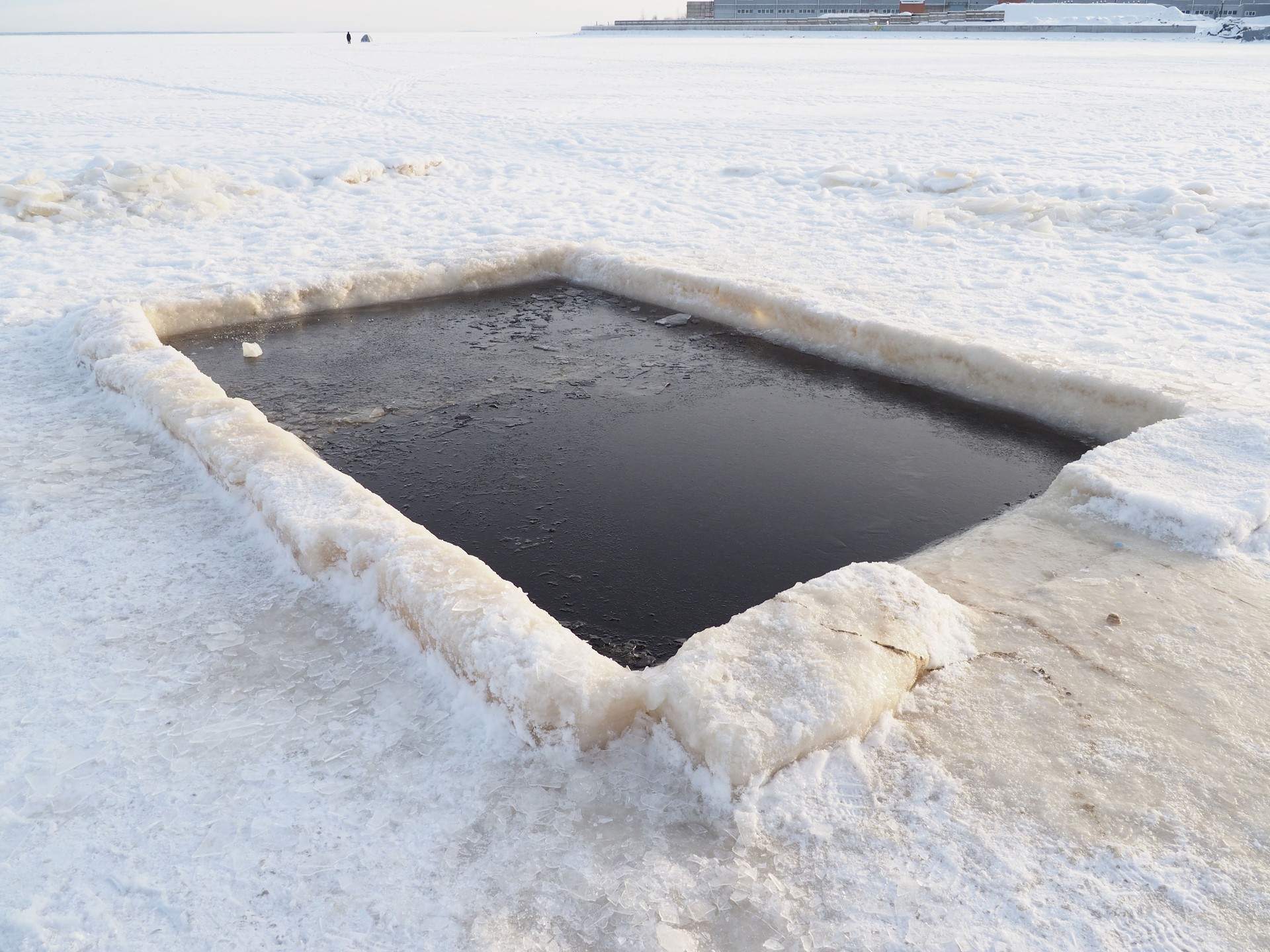 hole on the lake in winter